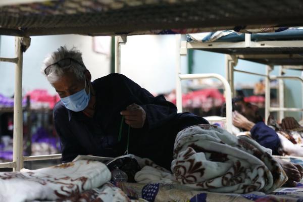 فعالیت 24 ساعته گرمخانه های تهران در روزهای سرد ، اسکان بعضی از معتادان در اتوبوس های سیار
